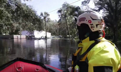 Rescuers warn of hazards walking through floodwater in Milton aftermath