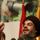 Who was Hassan Nasrallah and how did he lead Hezbollah?