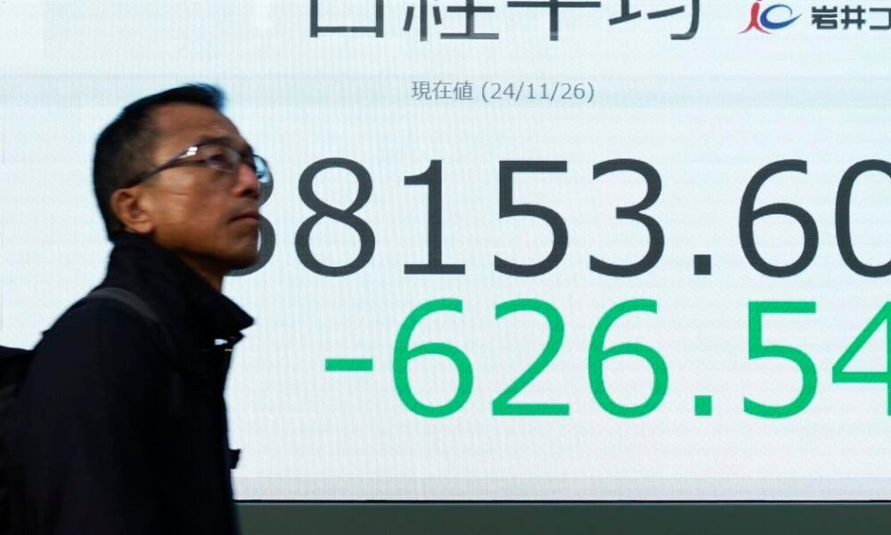 Stock market today: Wall Street hits records despite tariff talk