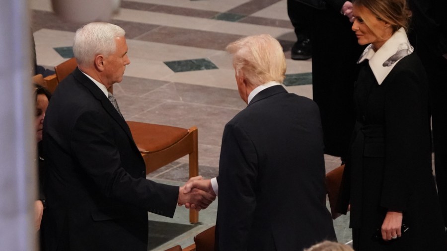 Pence said he congratulated Trump on his win at Carter’s funeral