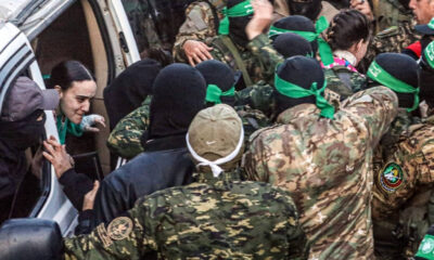 Three hostages released by Hamas transferred back into Israeli territory