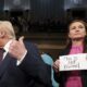 New Mexico Democrat says ‘This is not normal’ sign at Trump address was ‘an SOS to the world’