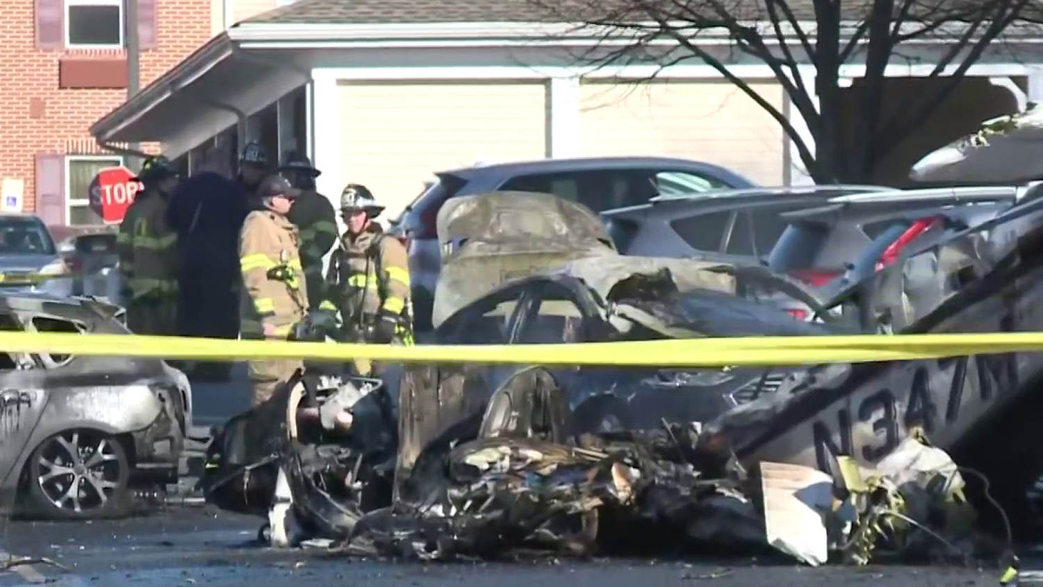 Small plane crashes into Pennsylvania parking lot