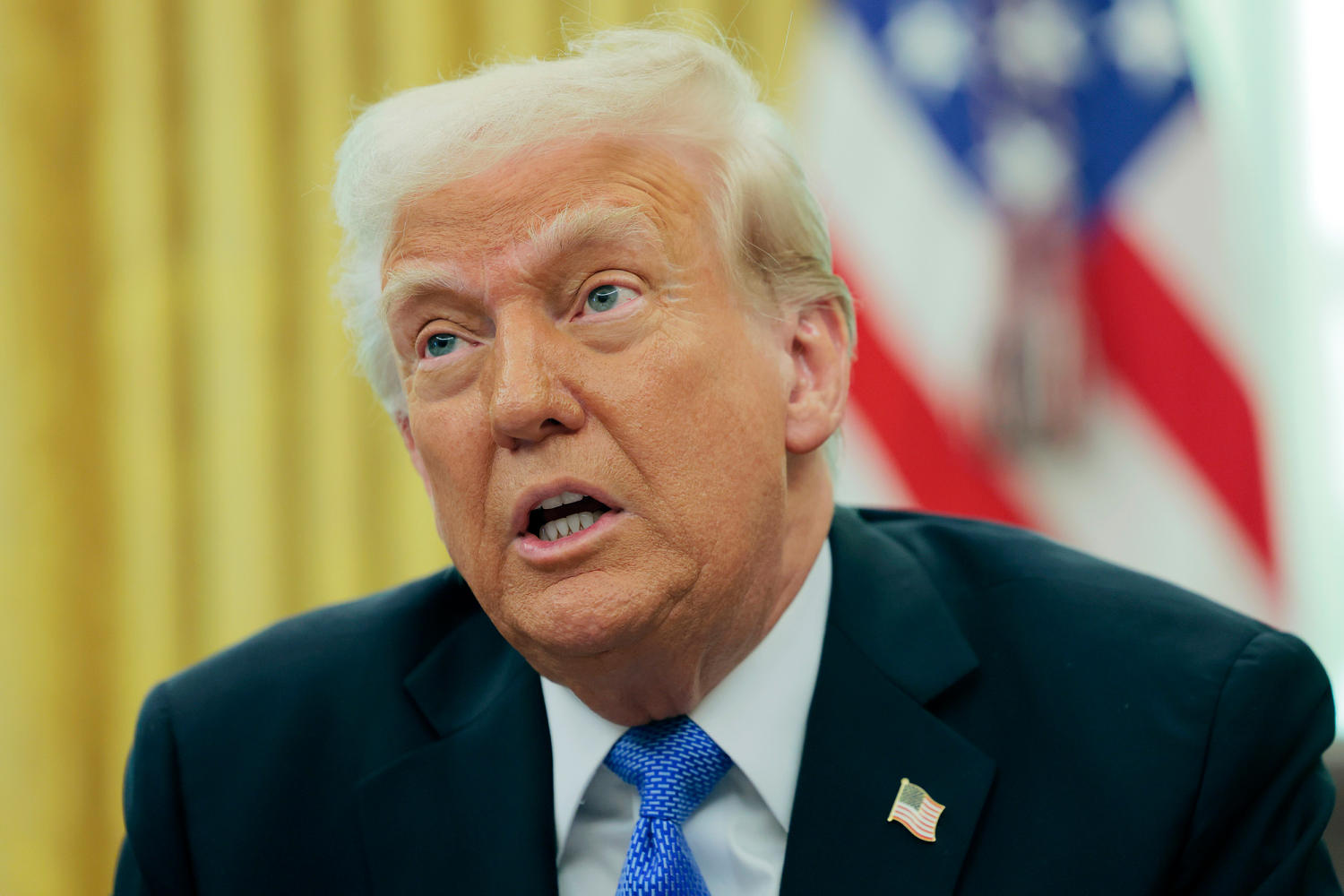 Trump hedges on whether he actually signed his Alien Enemies Act order