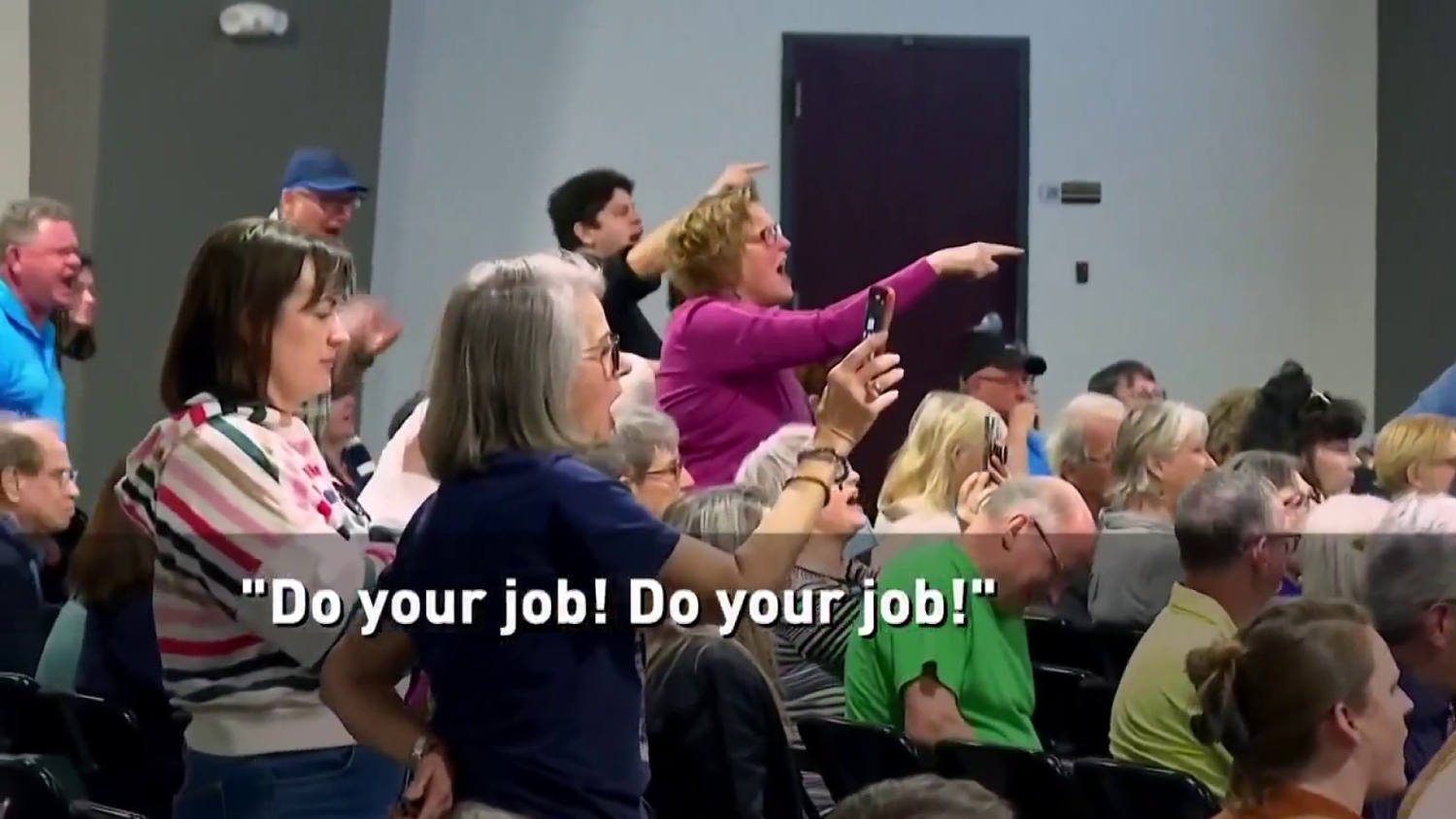 ‘Do your job!’: Crowd erupts in anger as GOP lawmaker defends deportations and Signal chat