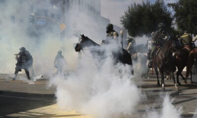 Officers deploy tear gas, rubber bullets to clear protesters in downtown L.A.