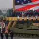 Military parade barrels through nation’s capital with tanks, troops and 21-gun salute