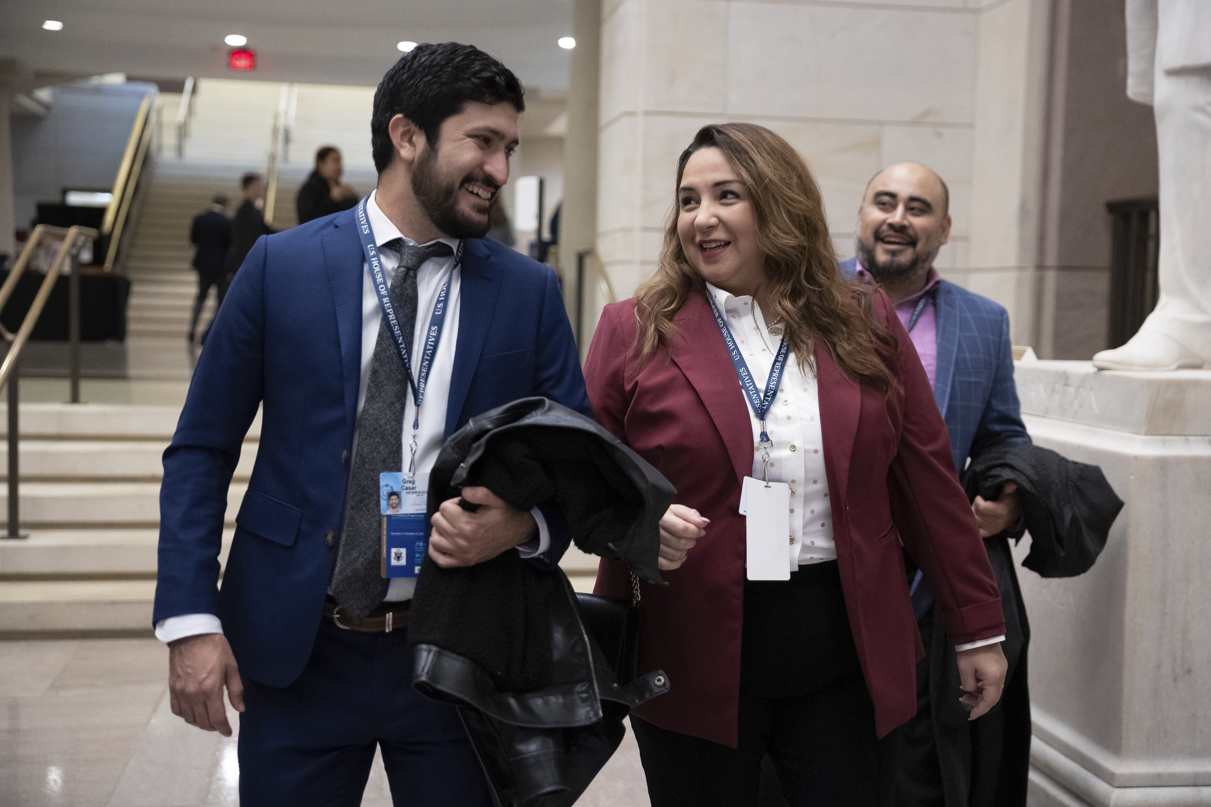 Representatives-elect Greg Casar (D-Texas) and Delia Ramirez (D-Ill.) converse as they enter a new member orientation session at the U.S. Capitol Nov. 18, 2022. 