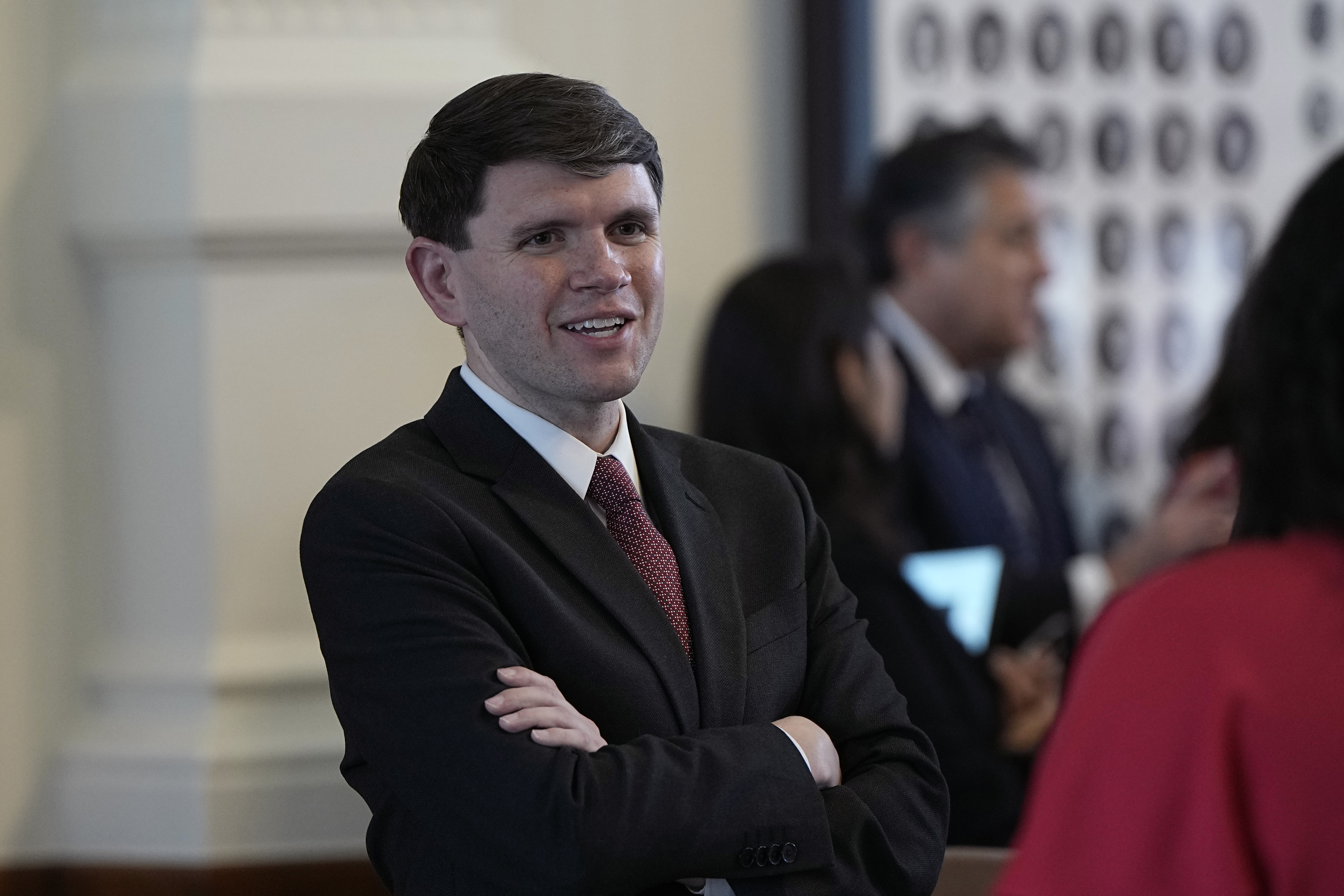 Texas state Rep. James Talarico talks with fellow lawmakers in Austin, Texas, Tuesday, May 23, 2023. 