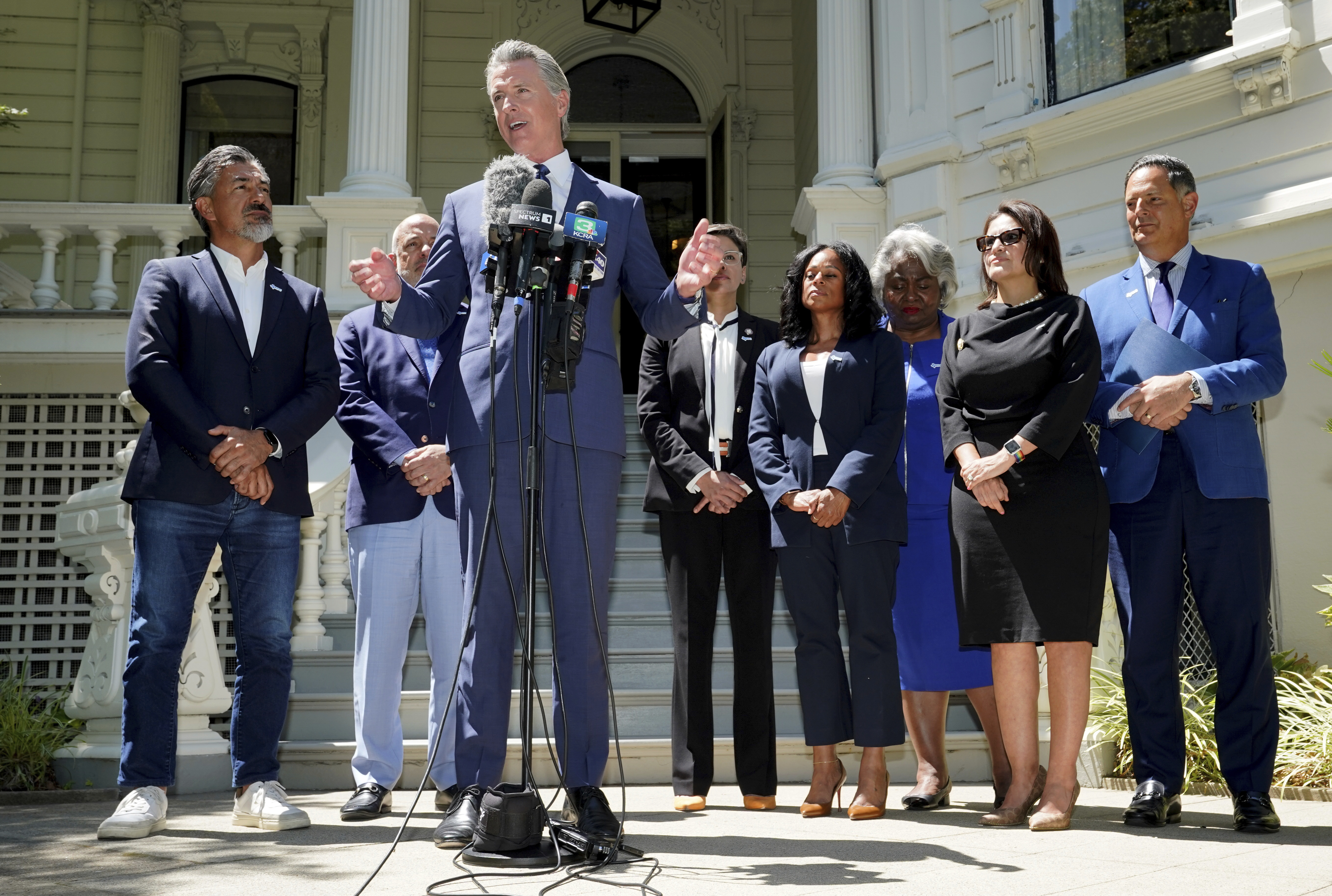 California Gov. Gavin Newsom, accompanied by several members of the Texas state Legislature, calls for a new way for California to redraw it's voting districts during a news conference In Sacramento, Calif., Friday July 25, 2025. 