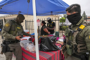 California lawmakers approve first-of-its-kind state ban on masked law enforcement