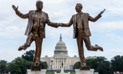 Golden statue of Trump and Epstein broken in premature removal from National Mall