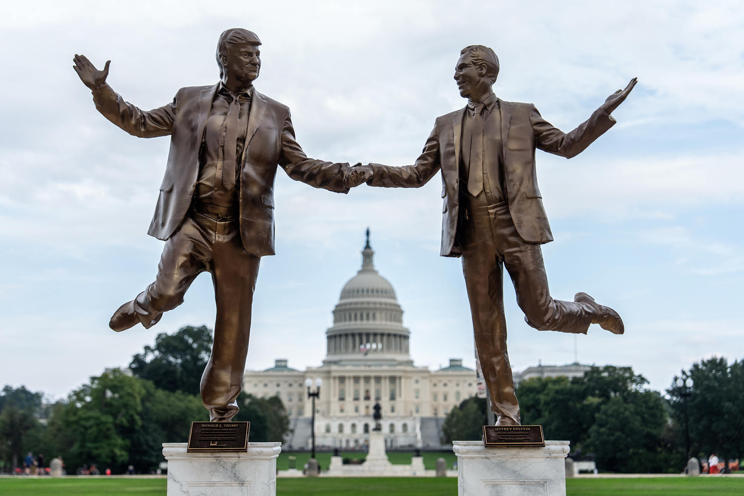Golden statue of Trump and Epstein broken in premature removal from National Mall