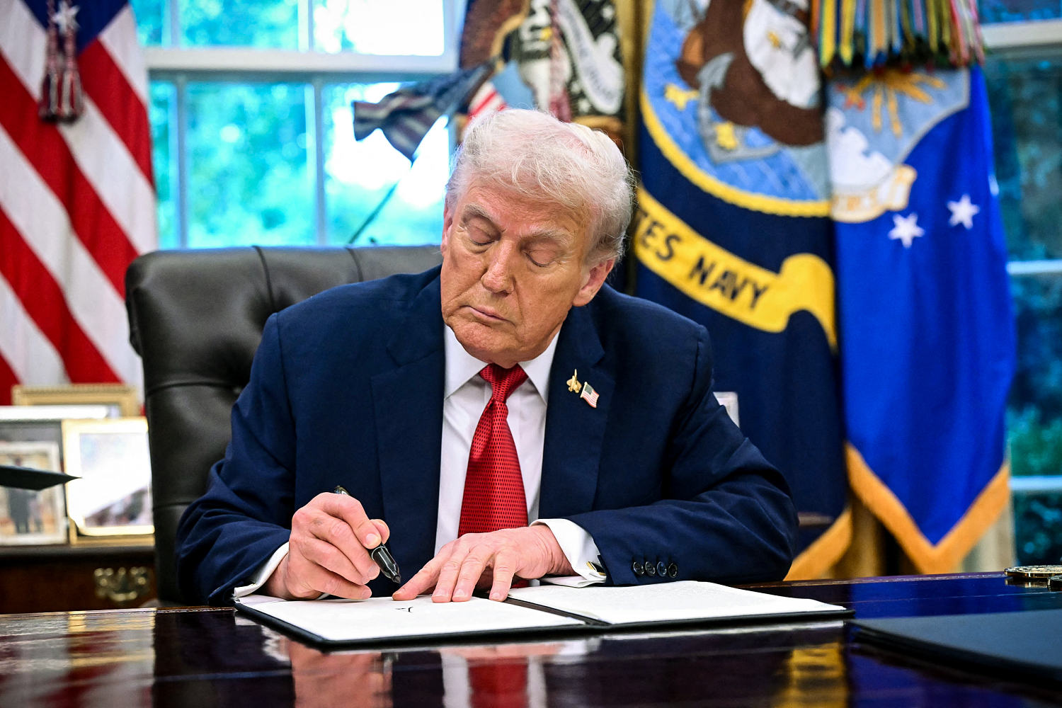 Trump signs executive order on TikTok