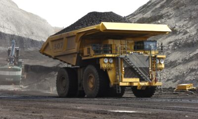 Trump opens land for coal mining, offers to boost coal-fired power plants