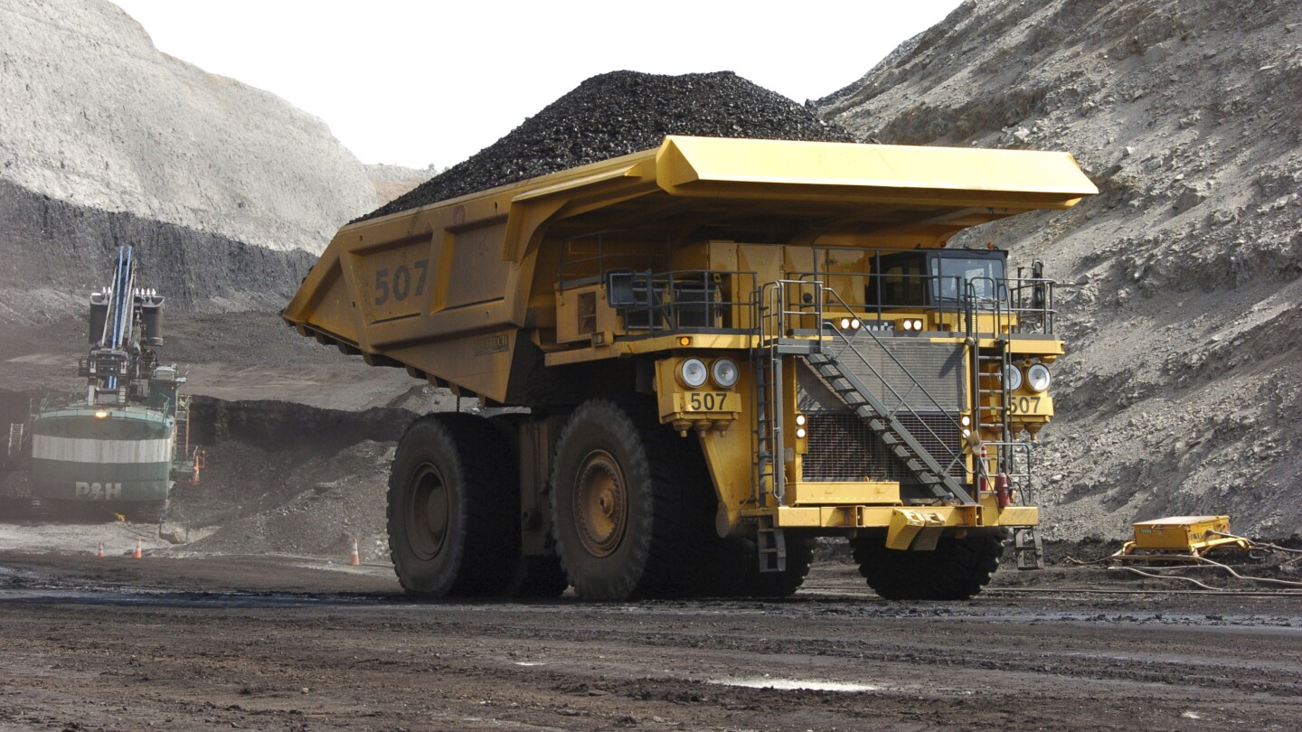 Trump opens land for coal mining, offers to boost coal-fired power plants