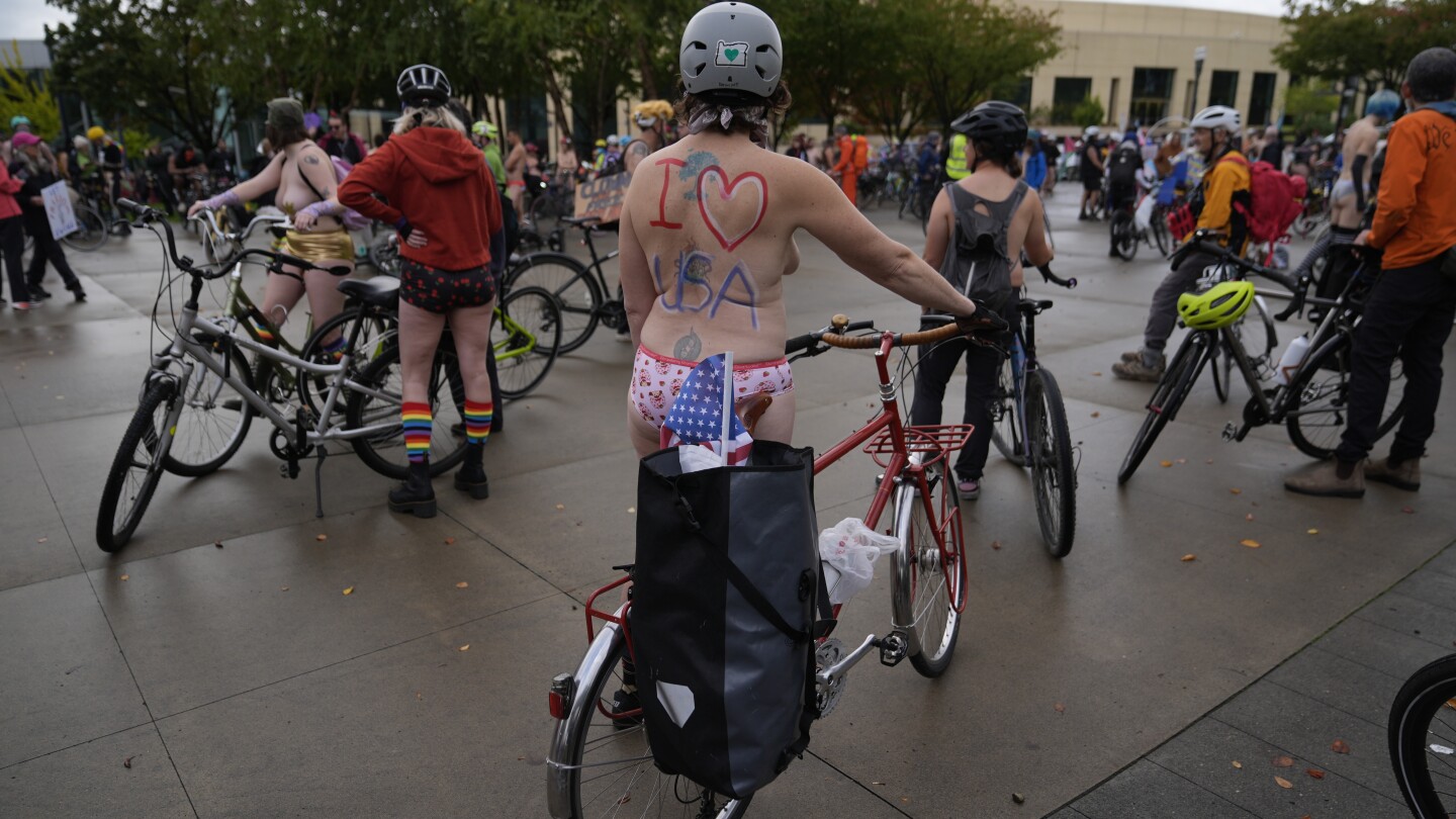 Naked bike riders demonstrate against troops in Portland…