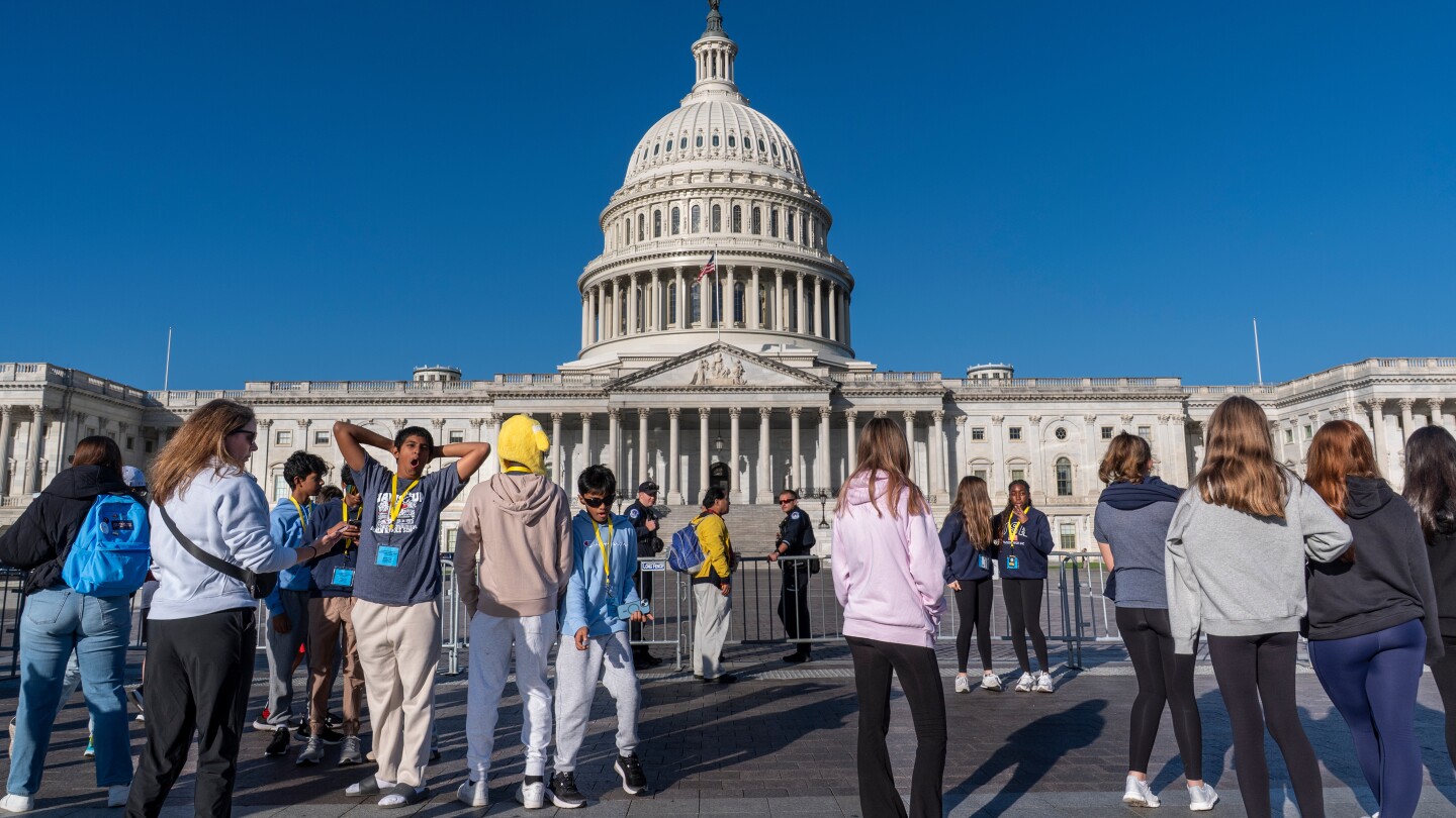 Judge halts layoffs by Trump administration during government shutdown