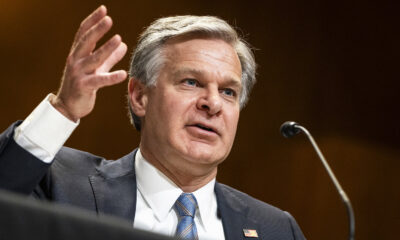 Trump adds Chris Wray and Merrick Garland to his growing list of prosecution targets