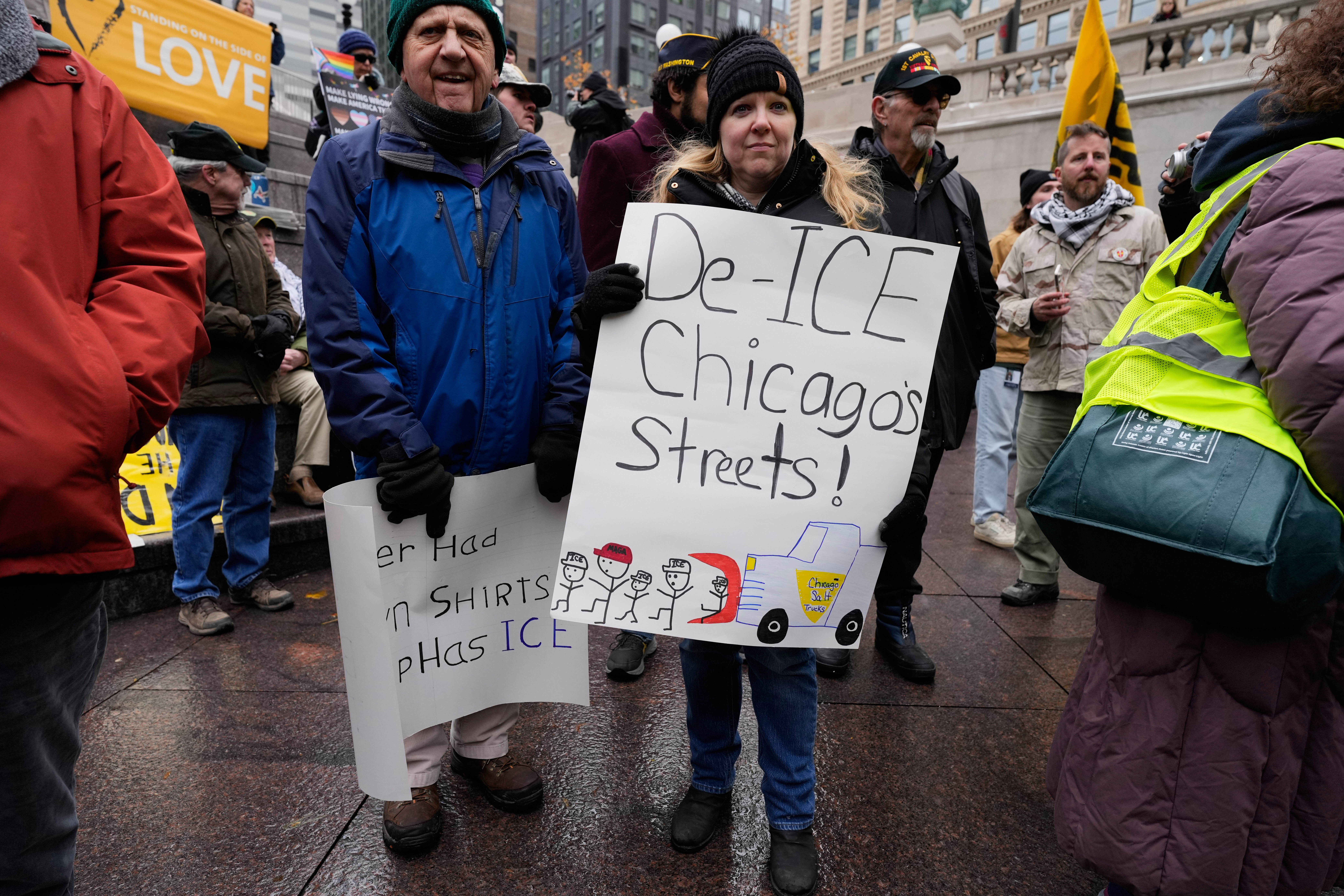 Veterans gather during veterans protest in Chicago, Tuesday, Nov. 11, 2025. (AP Photo/Nam Y. Huh)