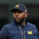 Michigan fired its football coach after a shocking scandal. Its athletic director should go, too.