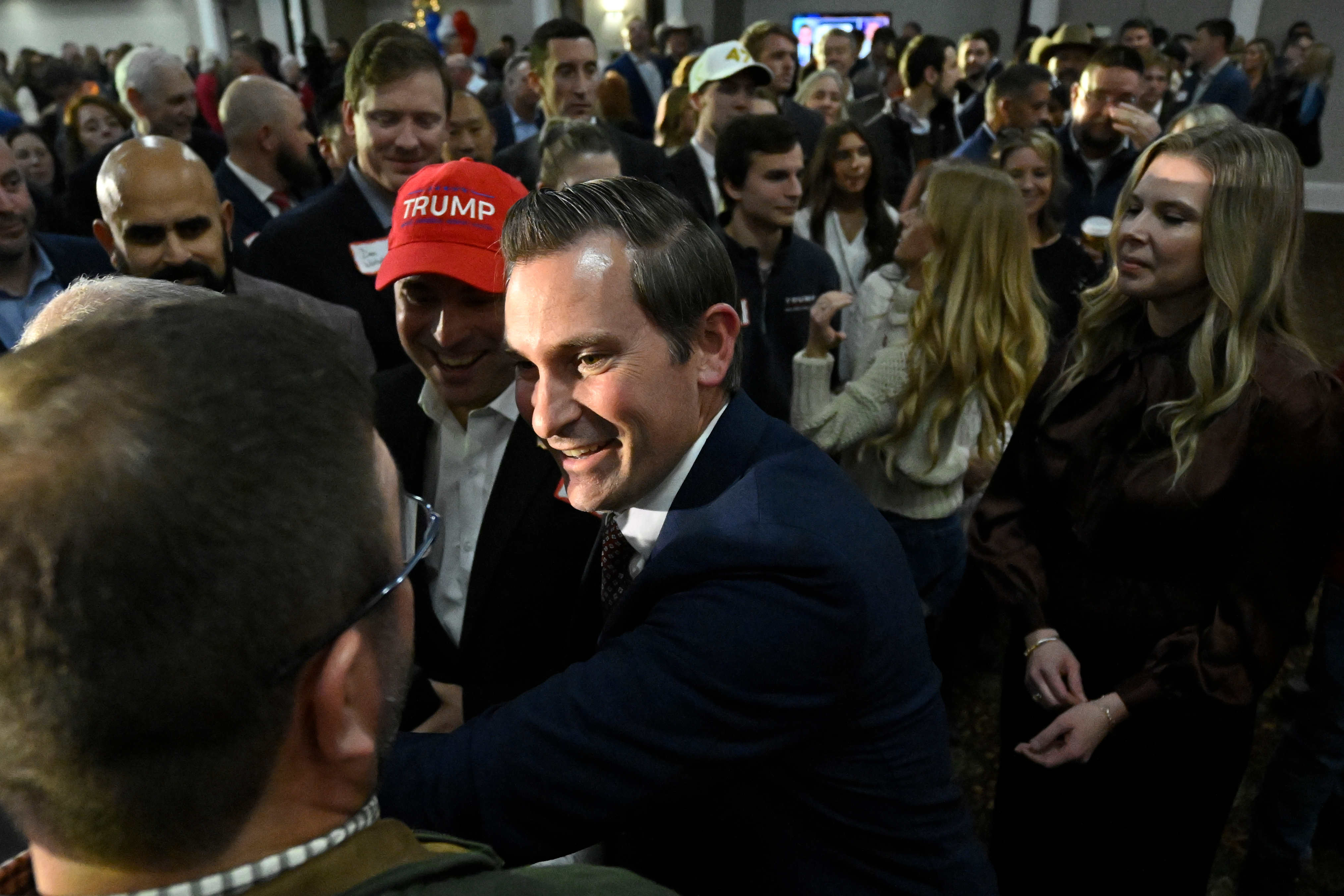 Republican candidate Matt Van Epps interacts with supporters at a watch party after announcing victory in a special election for the U.S. seventh congressional district, Dec. 2, 2025, in Nashville, Tennessee.