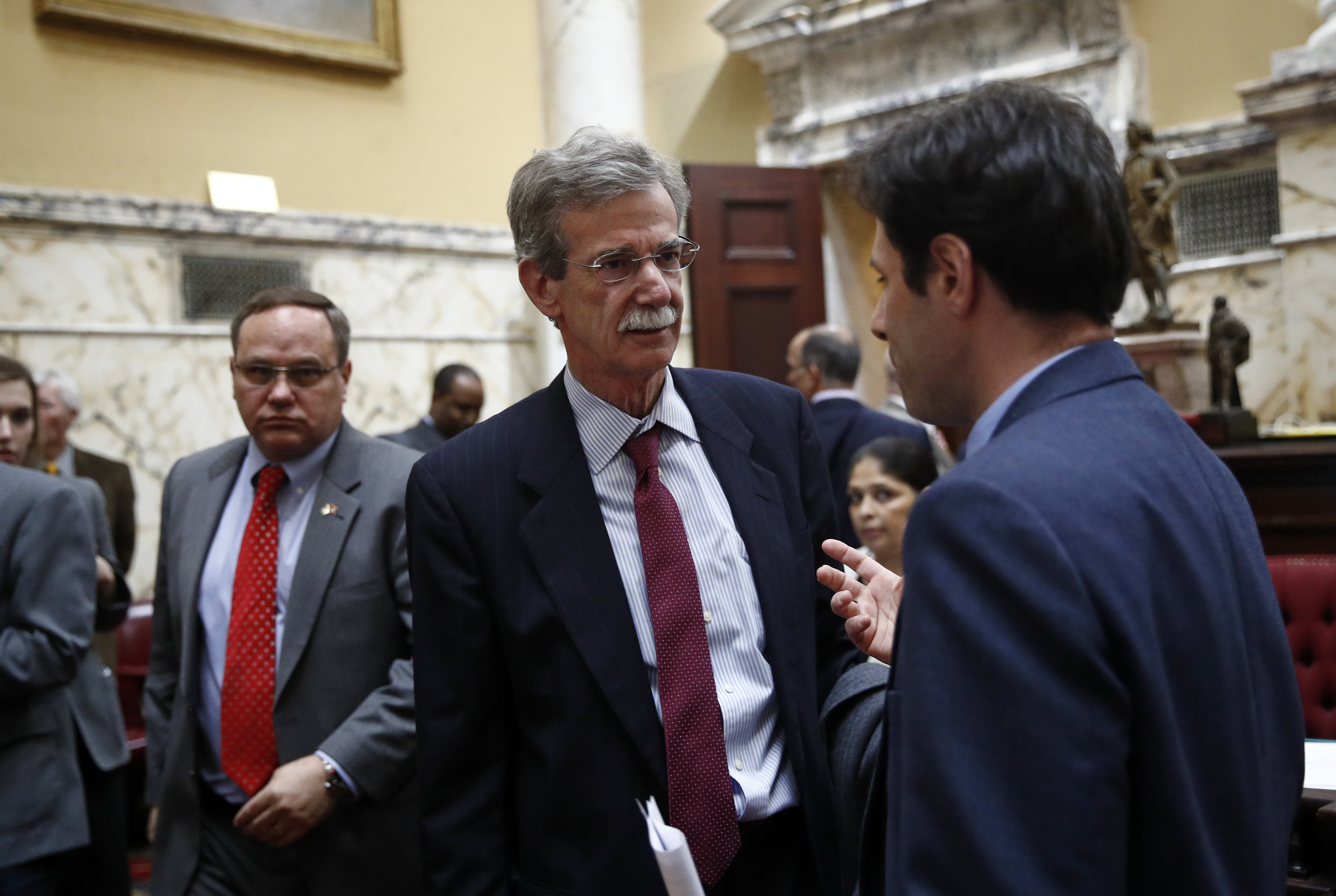 Maryland Attorney General Brian Frosh chats in the Maryland State Senate chamber in Annapolis, Maryland, Monday, April 9, 2018, the final day of the state's 2018 legislative session.