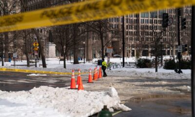 DC crews pile snow at RFK Stadium site as city slowly digs out of storm