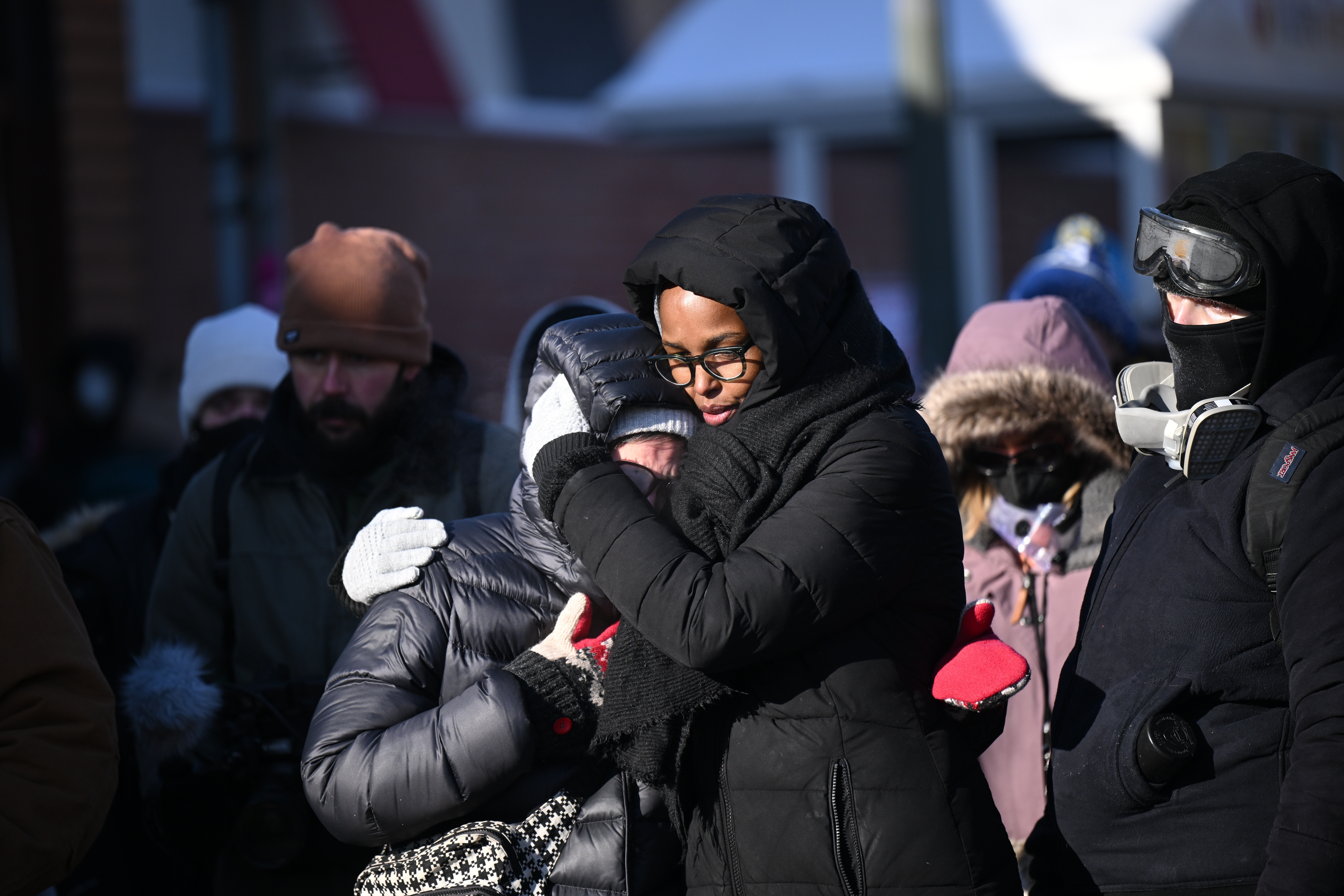 Protesters react in the street along Nicollet Avenue in Minneapolis after a man was fatally shot by a federal agent, on Jan 24, 2026.