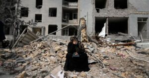 The Latest: US hits pro-government demonstration in Iran as war threatens global economy