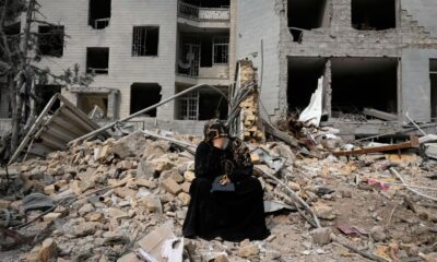 The Latest: US hits pro-government demonstration in Iran as war threatens global economy