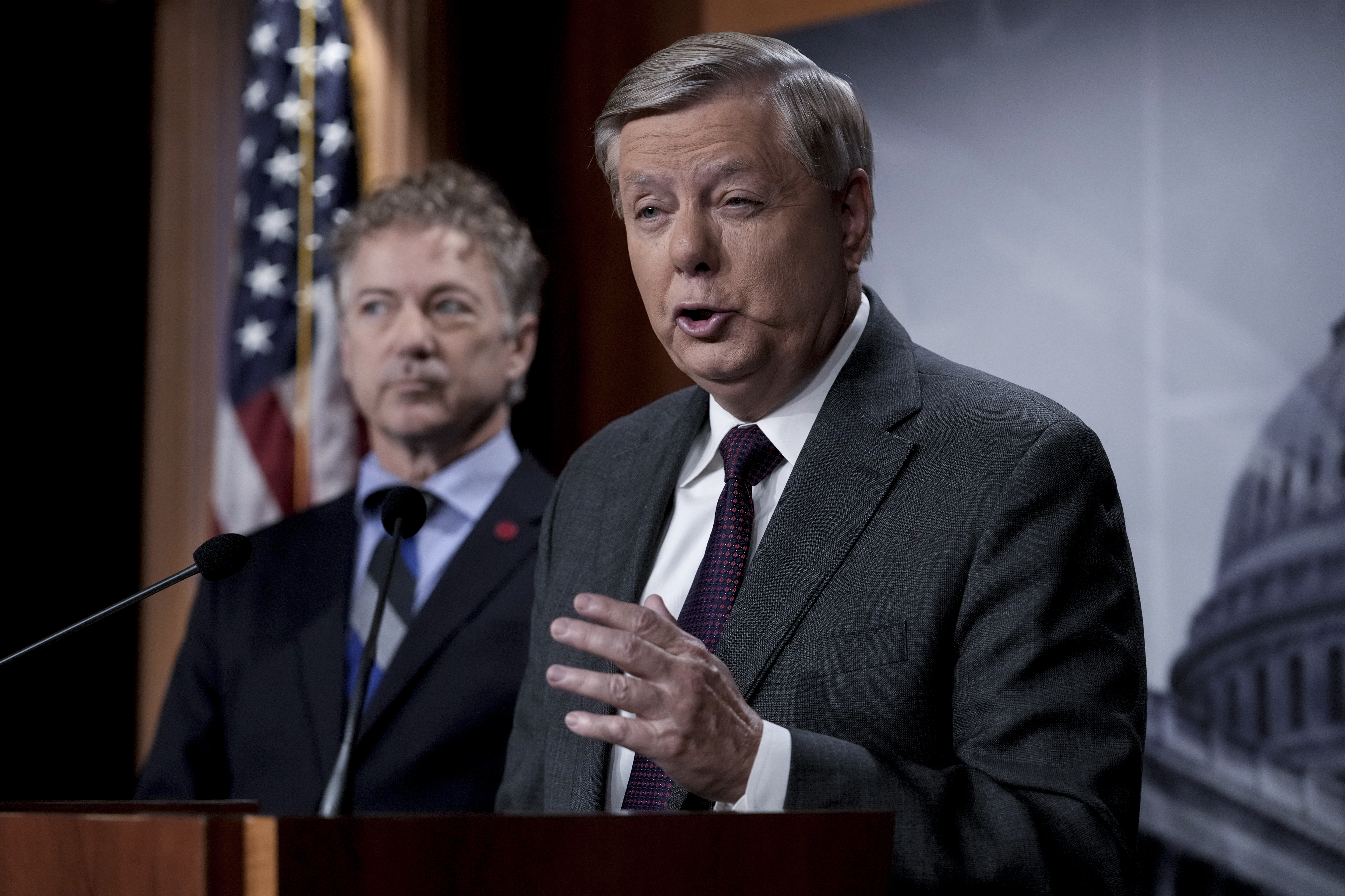 Kentucky Sen. Rand Paul (left), seen in 2022, has been a frequent GOP critic of Graham's interventionist beliefs.