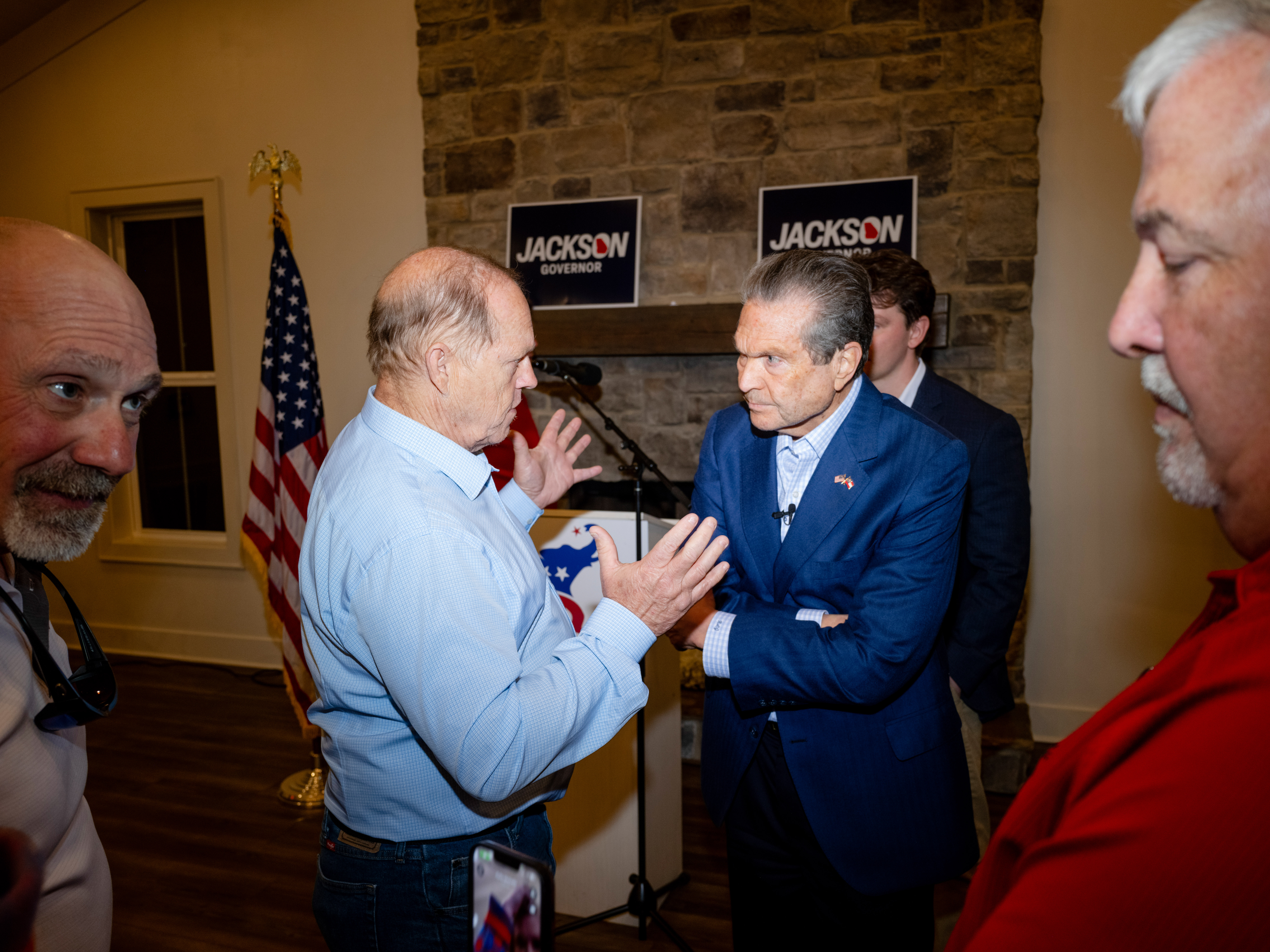 Jackson speaks with constituents at the Chimney Oaks Golf Club in Homer.