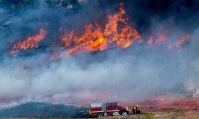 Crews making progress containing Southern California wildfire as some mandatory evacuations remain