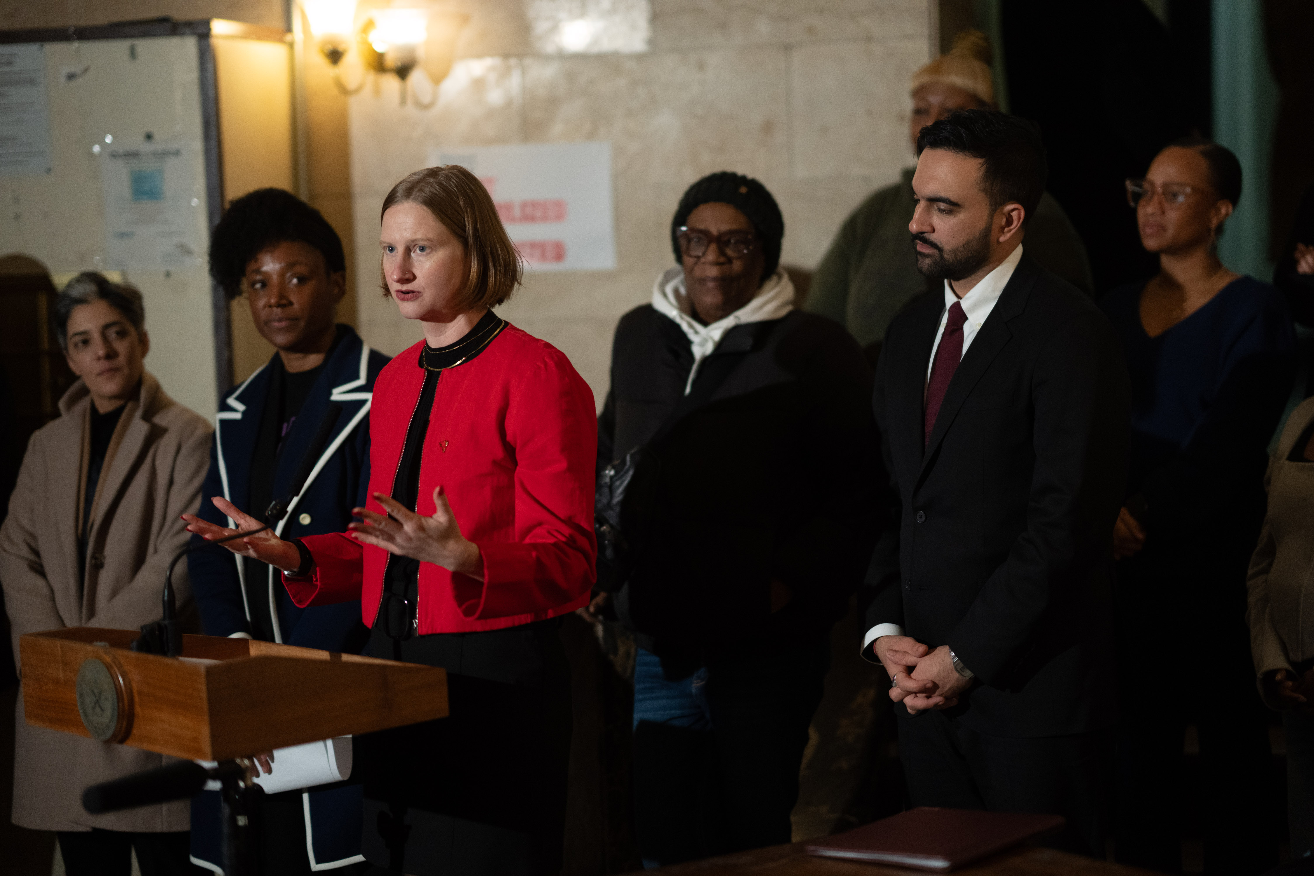 Tenant czar Cea Weaver pushes (third from left) housing panel to confront overdue state budget. 