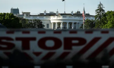 A bulletproof vest, ballistic glass and a president who carries on