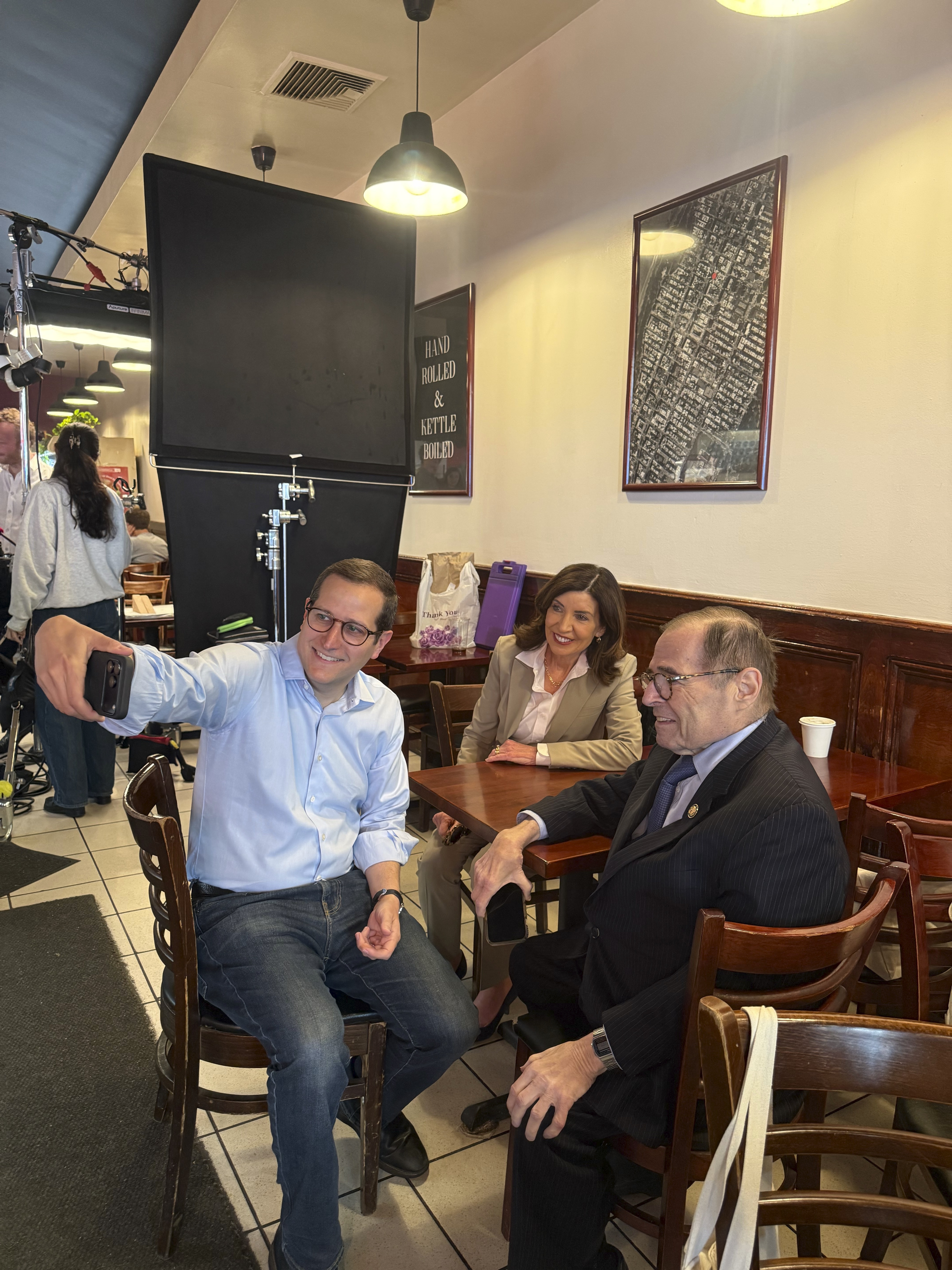 Assemblymember Micah Lasher was joined by Gov. Kathy Hochul and Rep. Jerry Nadler at a bagel shop Wednesday to film a video for Lasher's campaign for congress.
