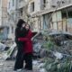 Russian attack on Ukraine capital kills at least 3 and traps others in damaged buildings