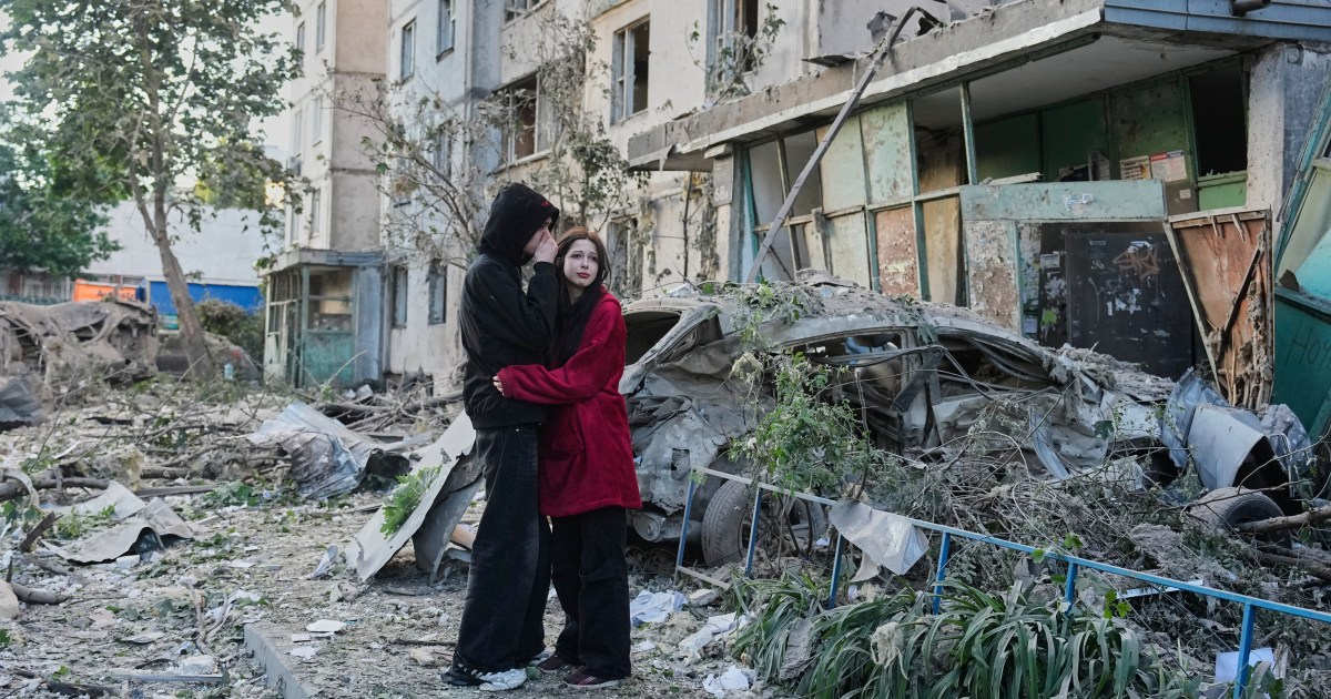 Russian attack on Ukraine capital kills at least 3 and traps others in damaged buildings
