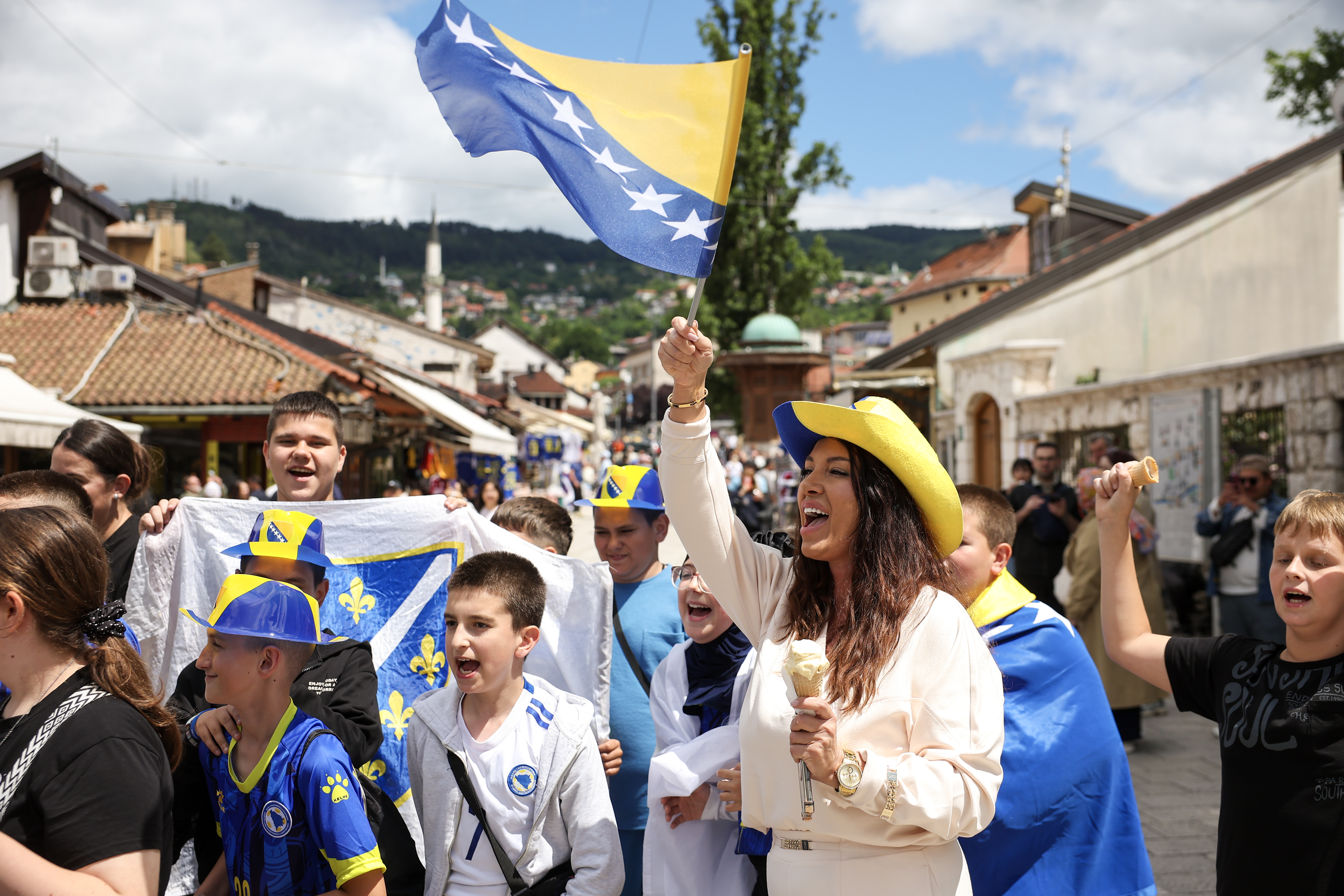 Bosnia refugees in Utica celebrate ahead of Bosnia and Herzegovina's match against Canada in the World Cup. 