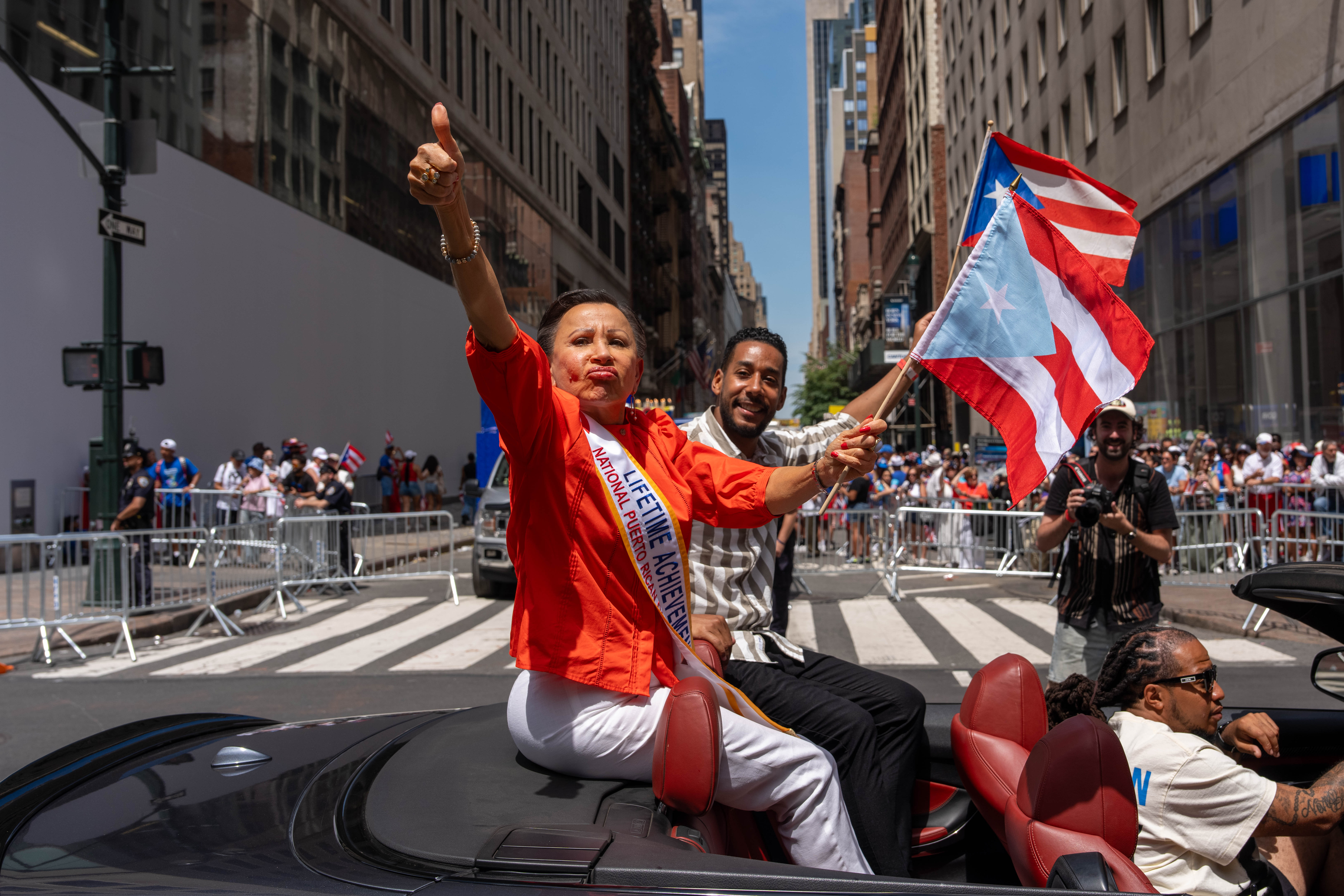 Rep. Nydia Velázquez and Brooklyn Borough President Antonio Reynoso take part in the National Puerto Rican Day Parade on June 14, 2026 in New York. 