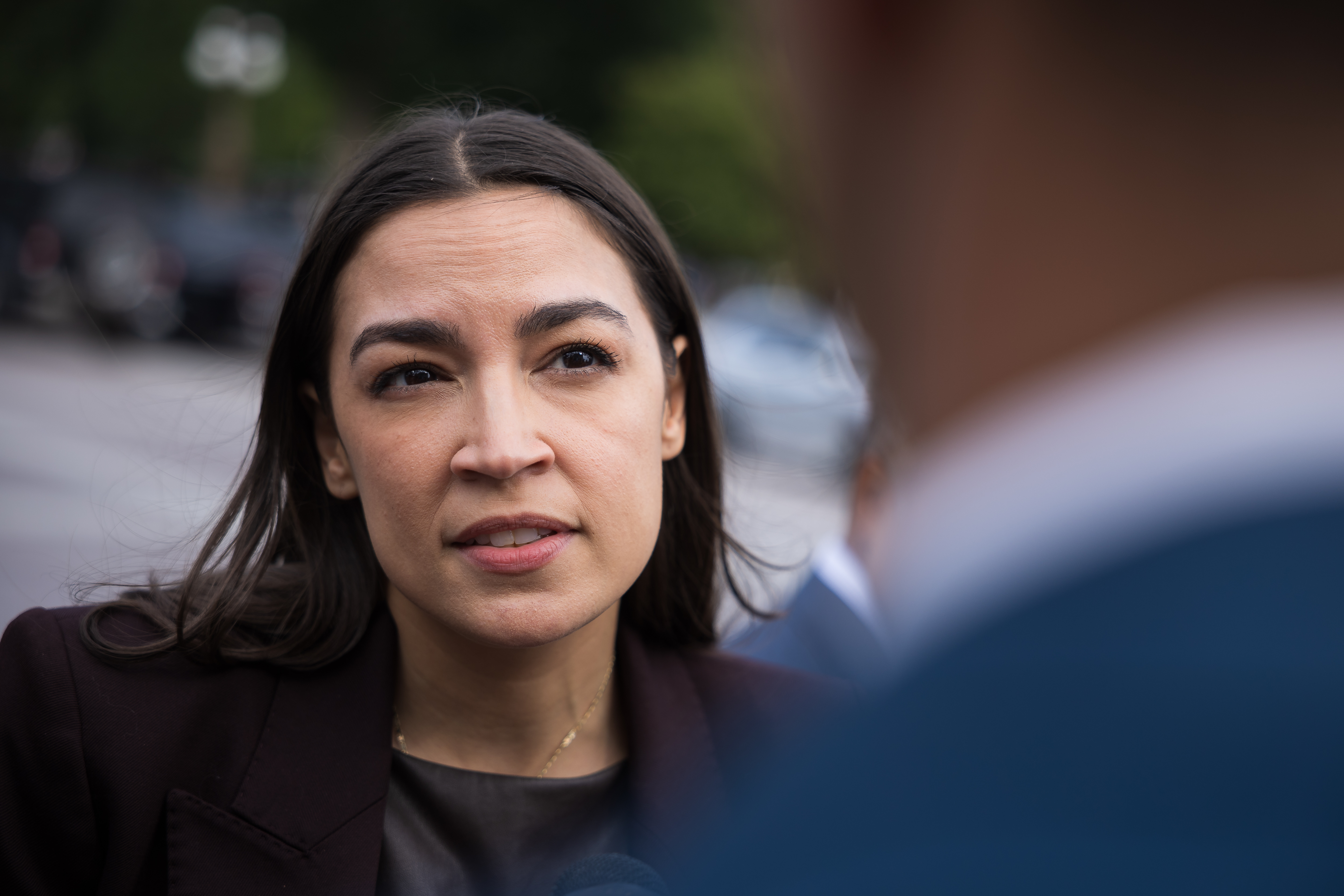 Rep. Alexandria Ocasio-Cortez speaks with reporters outside the U.S. Capitol on June 9, 2026. 