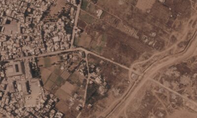 Israel is building a miles-long earthen barrier inside Gaza, entrenching its division