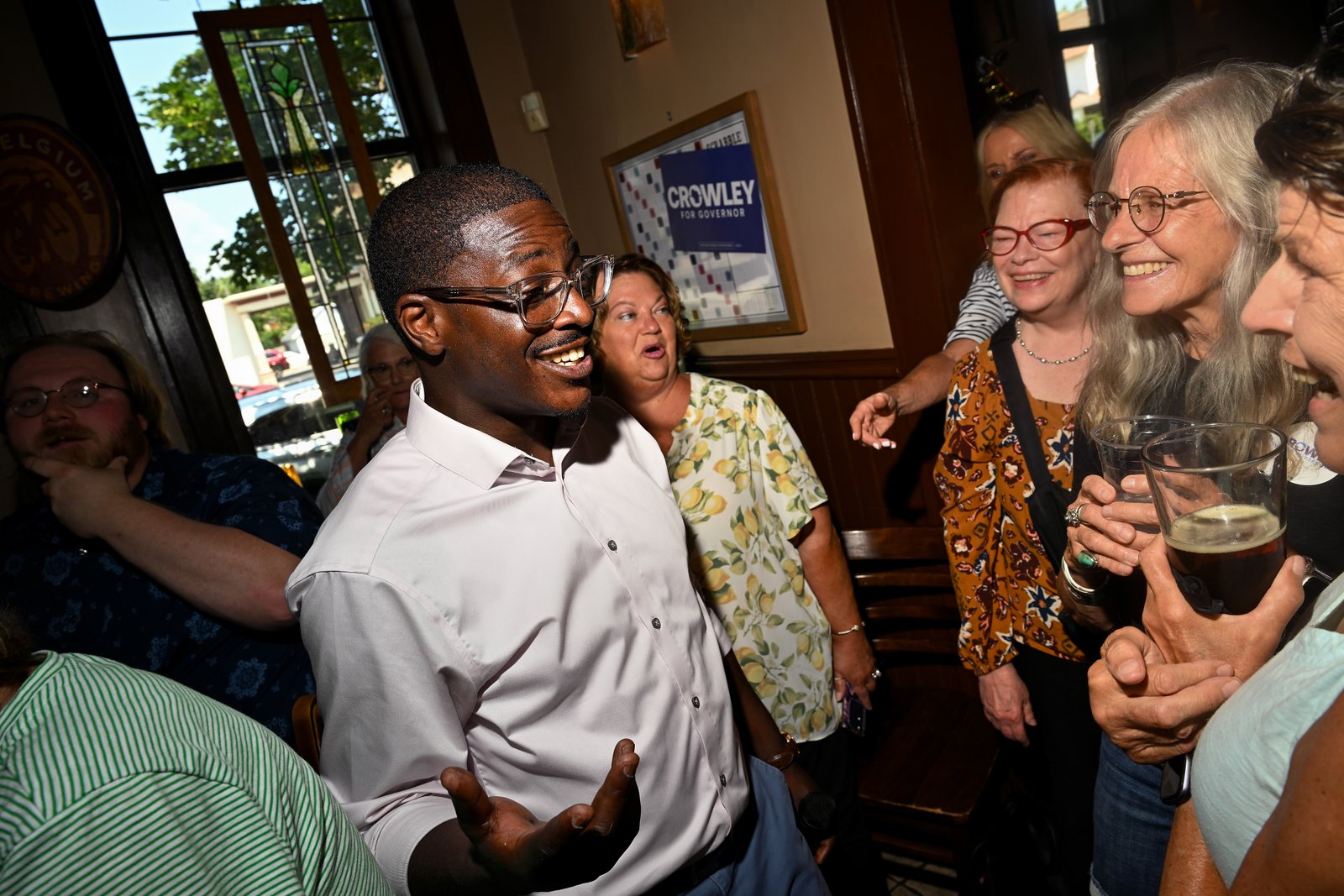 Gubernatorial candidate David Crowley greets people during a campaign stop at a restaurant in Sheboygan on Aug. 7.
