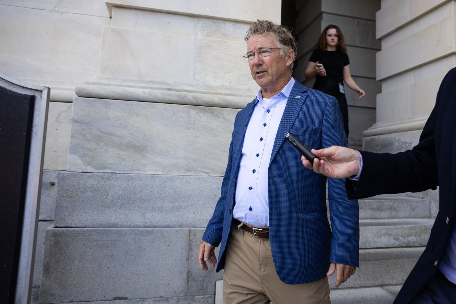 Sen. Rand Paul (R-Ky.) speaks with reporters as he departs the U.S. Capitol on Aug. 3, 2026. 