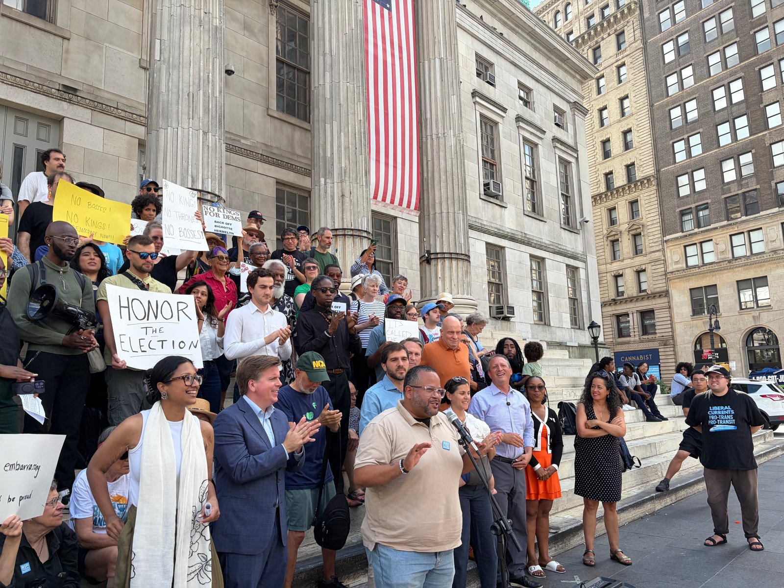 Julio Peña III speaks at a rally opposing changing the makeup of the Brooklyn Democratic Party's executive committee in front of Brooklyn Borough Hall on Aug. 24, 2026.