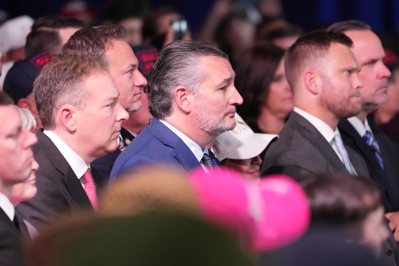 Sen. Ted Cruz (R-Texas), center, listens to Trump speak during the Texas rally.