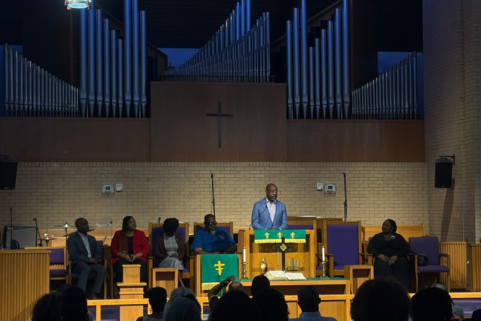 Sen. Raphael Warnock addresses a gathering of faith leaders at St. Joseph’s AME Church in Durham, N.C..